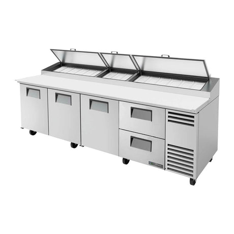 True TPP-AT-119D-2-HC 119-1/4" 3-door 2-drawer pizza prep table with (15) 1/3 size pans, doors and drawers closed, lid open