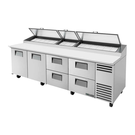 True TPP-AT-119D-4-HC 119-1/4" 2-door 4-drawer pizza prep table with (15) 1/3 size pans, doors and drawers closed, lid open
