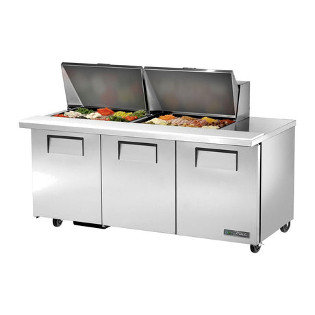 True TSSU-72-24M-B-ST-HC 72-3/8" 3-door mega top sandwich/salad prep table with (24) 1/6 size pans, doors closed, lid open